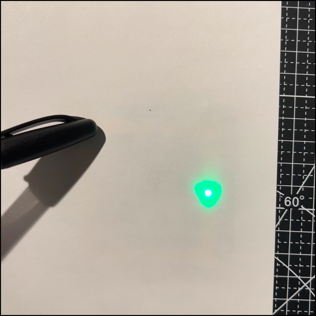 When the X is pressed, the circuit closes and the light turns on.