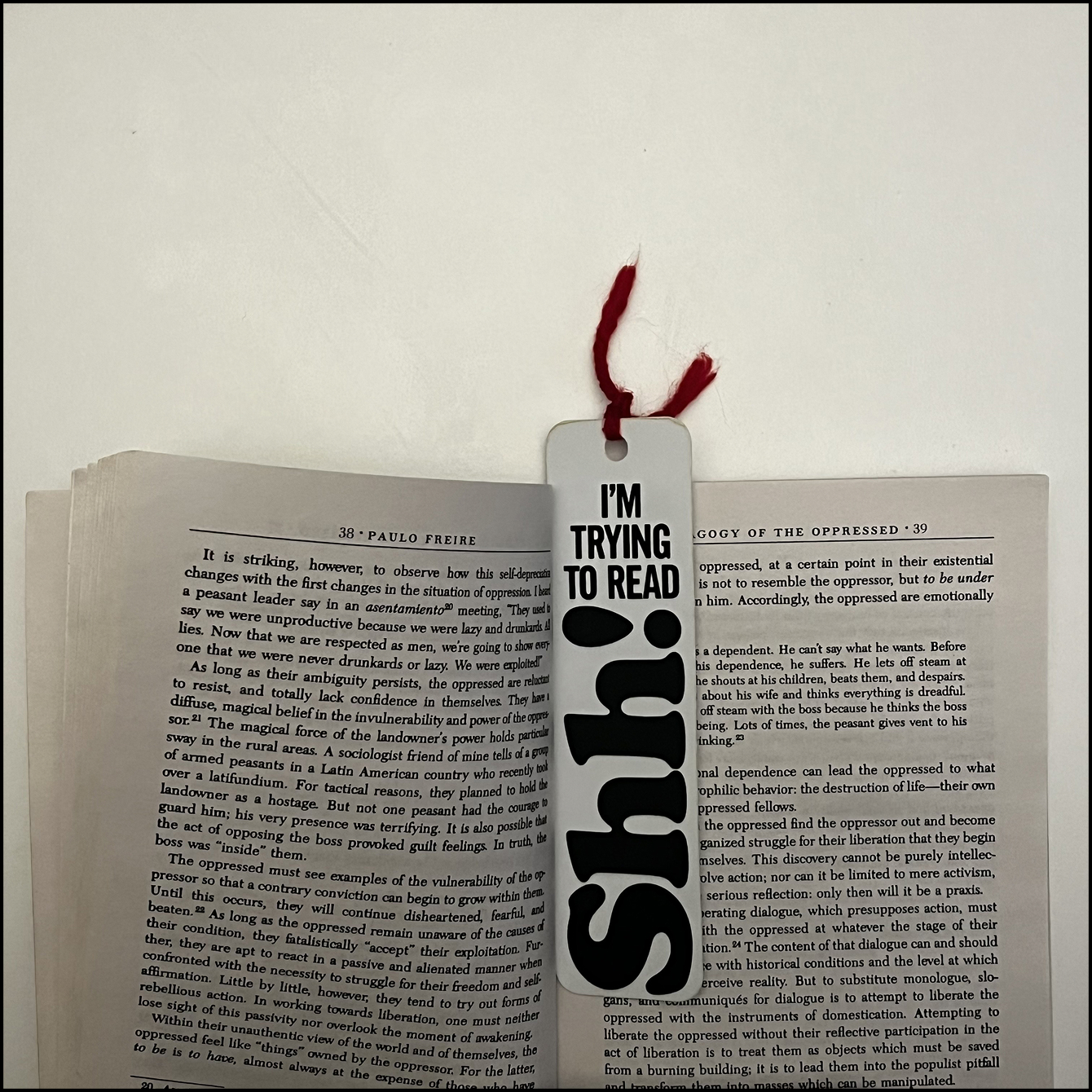 Open book with bookmark placed where the pages separate, this is where the circuit will be placed